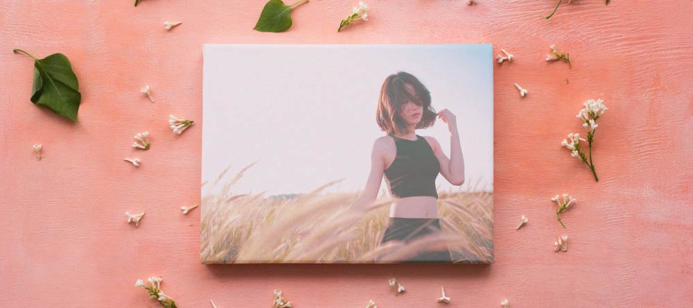 What is a Canvas Print? Small-format canvas print with photo of young lady.
